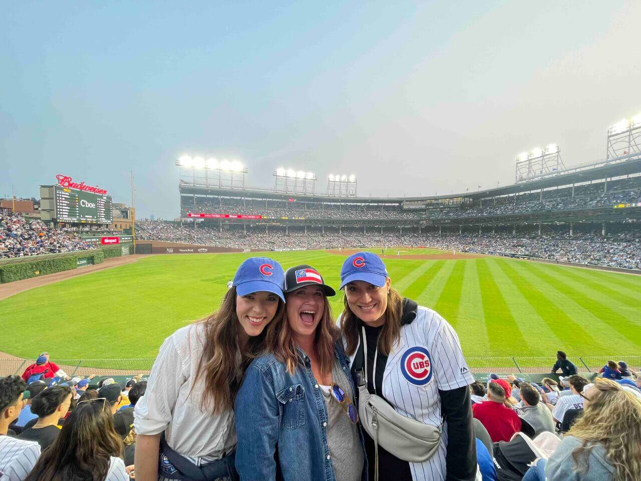 Inuvo employees enjoying a Cubs game while at the Summer Sales Summit in Chicago